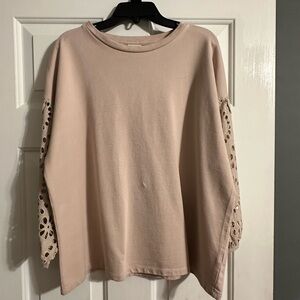 This blouse can be worn with jeans or slacks for work.